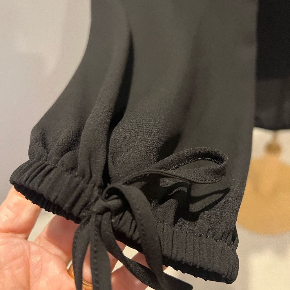Chic Black Ruffled Blouse - Picture 2 of 3